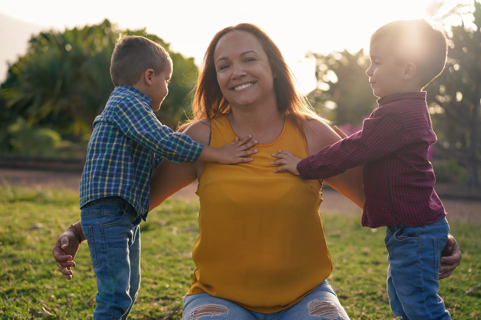 mother in park with young boys now safe