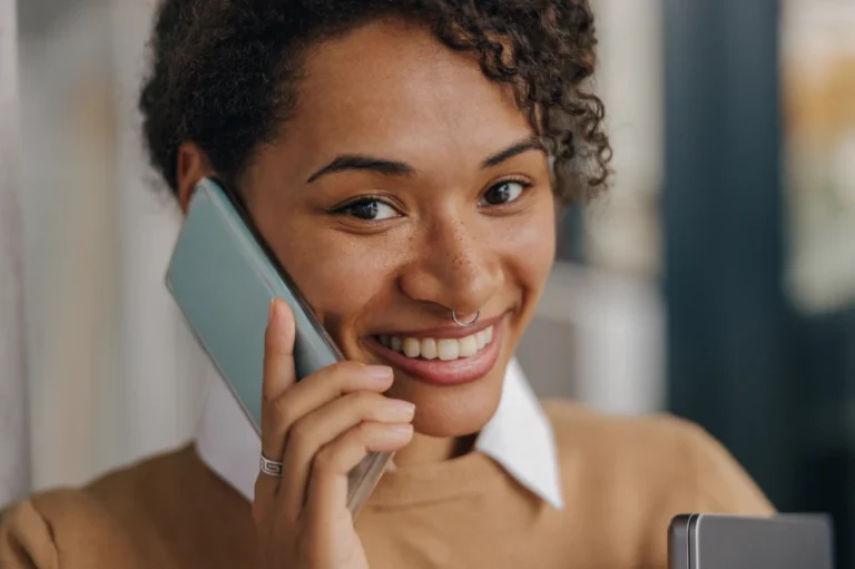 woman on phone getting tech support for her security cameras